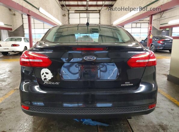 1FADP3F23GL233747 2016 FORD FOCUS Black Вид ззаду
