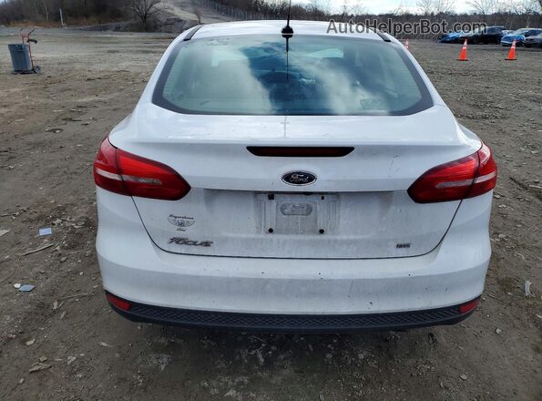 1FADP3F23JL206071 2018 FORD FOCUS Белый Вид сзади