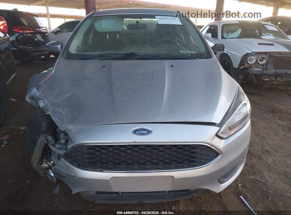 1FADP3F26GL319621 2016 FORD FOCUS Серебряный Вид задней части салона
