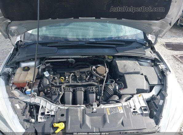 1FADP3F27GL244671 2016 FORD FOCUS Silver Vista trasera