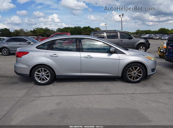 1FADP3F29GL341001 2016 FORD FOCUS Серебряный Вид задней части салона