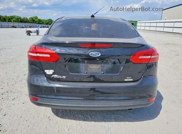 1FADP3FE3GL318128 2016 FORD FOCUS Черный Вид сзади