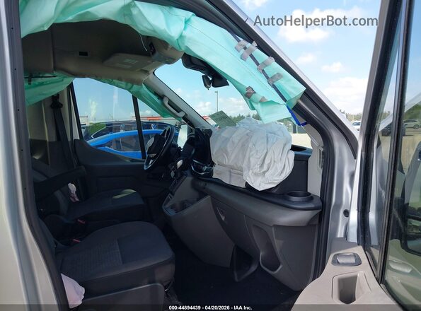 1FBAX2C87RKA83476 2024 FORD PASSENGER Silver წინა სალონის ხედი