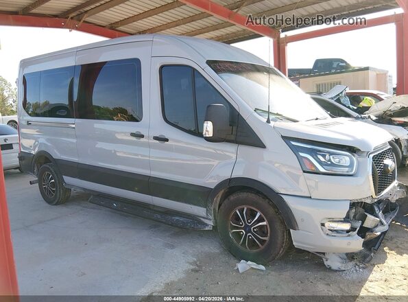 1FBAX2CG4PKB83295 2023 FORD PASSENGER Gray Սալոնի հետևի տեսք