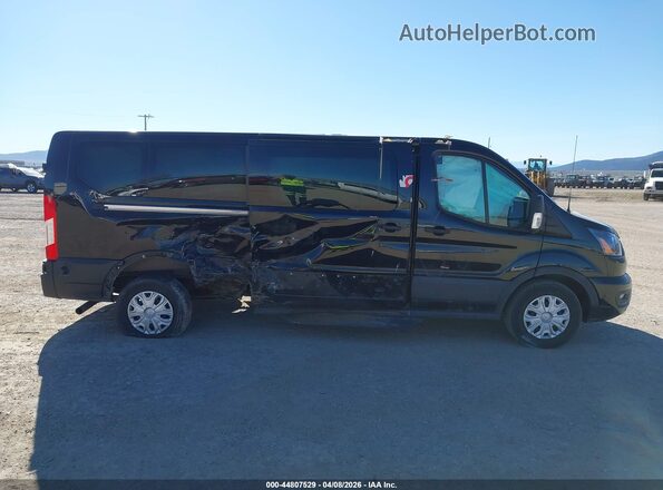 1FBAX2Y85RKA43180 2024 FORD PASSENGER Черный Вид задней части салона
