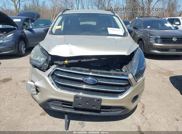 1FMCU0G92HUE28691 2017 FORD ESCAPE Gold Widok zestawu wskaźników