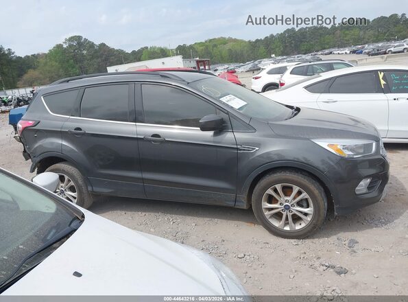 1FMCU0GD4JUD33754 2018 FORD ESCAPE Gray Widok wnętrza z tyłu