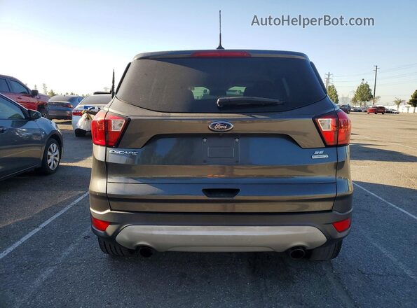 1FMCU0GD5KUB79329 2019 FORD ESCAPE Серый Вид сзади