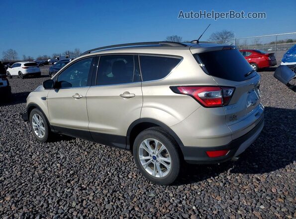 1FMCU0GD8HUB59407 2017 FORD ESCAPE Gold Trasero izquierdo