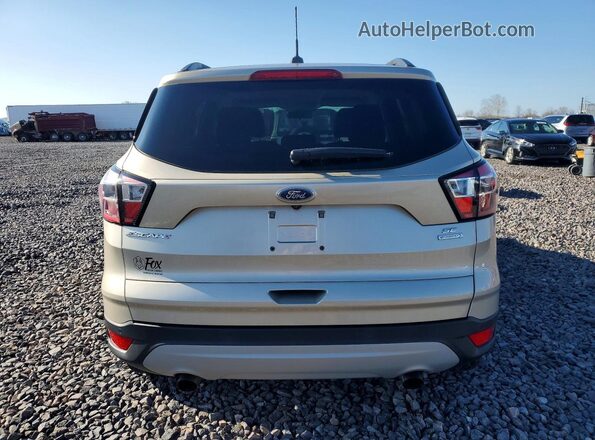 1FMCU0GD8HUB59407 2017 FORD ESCAPE Gold Vista trasera