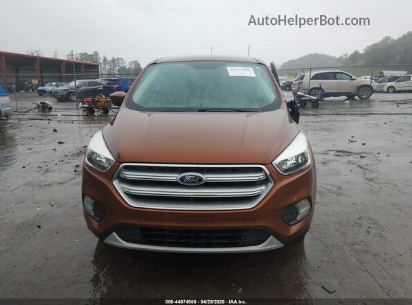 1FMCU9GD3HUB76457 2017 FORD ESCAPE Оранжевый Вид щитка приборов