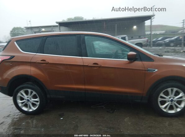 1FMCU9GD3HUB76457 2017 FORD ESCAPE Оранжевый Вид задней части салона
