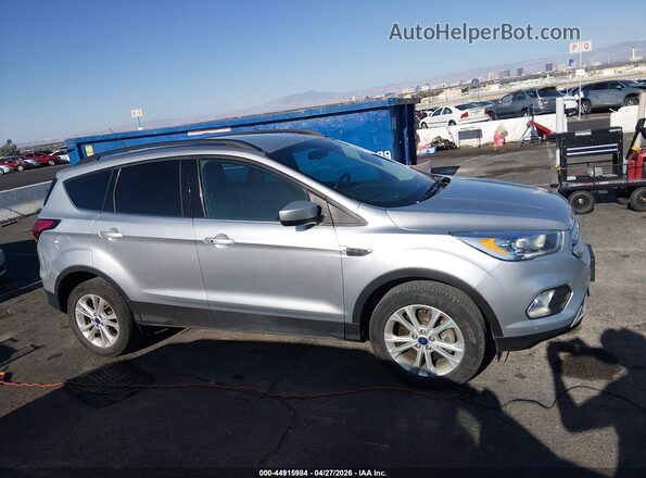 1FMCU9HD2KUC29462 2019 FORD ESCAPE Серебряный Вид задней части салона
