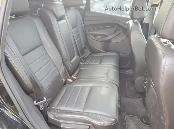 1FMCU9J98GUA08185 2016 FORD ESCAPE Black Widok wnętrza z tyłu