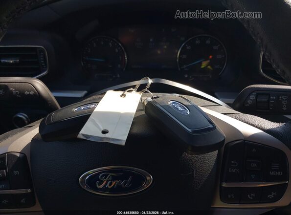 1FMSK8DH8NGA38278 2022 FORD FORD EXPLORER Белый Вид панели приборов