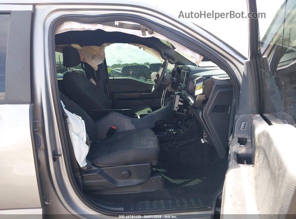1FTEW1CP4PKF37519 2023 FORD F150 Серебряный Вид салона спереди