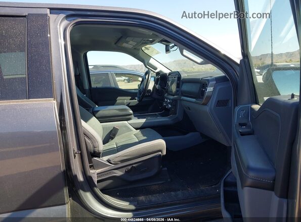 1FTEW3KP4RKD17703 2024 FORD F150 Gray Vista interior delantera