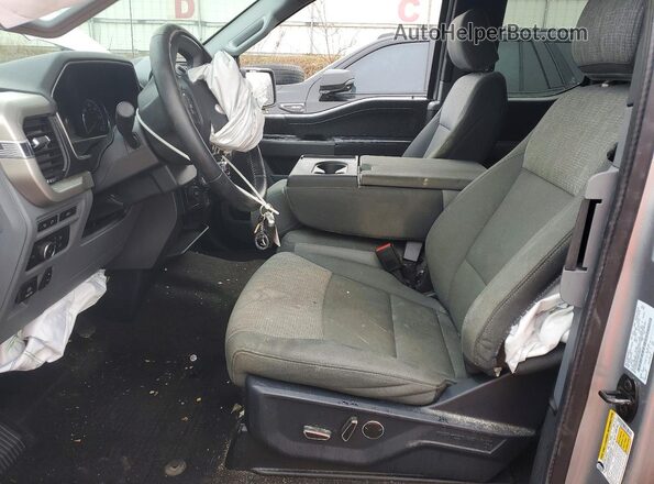 1FTEX1EPXMKD40652 2021 FORD F150 Silver Vista interior delantera