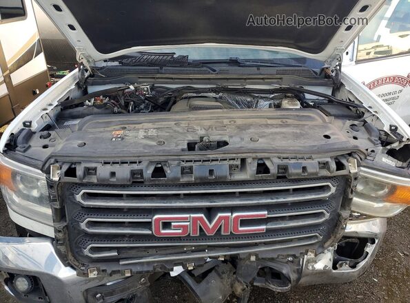 1GD02REG1JZ259903 2018 GMC SIERRA White Widok wnętrza z tyłu