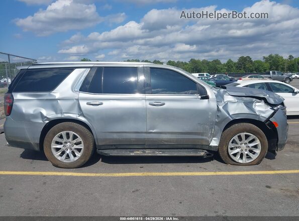 1GNSCSKD9RR237212 2024 CHEVROLET TAHOE Серебряный Вид задней части салона