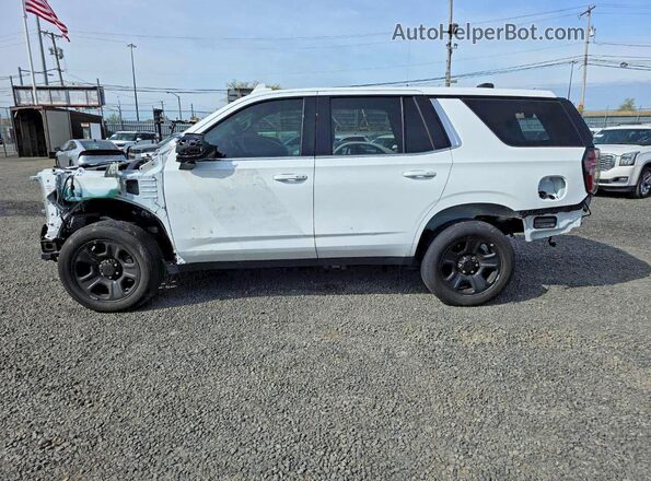 1GNSKLED8NR304848 2022 CHEVROLET TAHOE White Սալոնի հետևի տեսք