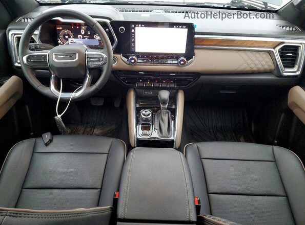 1GTP2FEK6T1105775 2026 GMC CANYON Черный Вид панели приборов