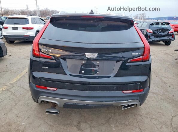 1GYFZDR48MF081095 2021 CADILLAC XT4 Black Rear view