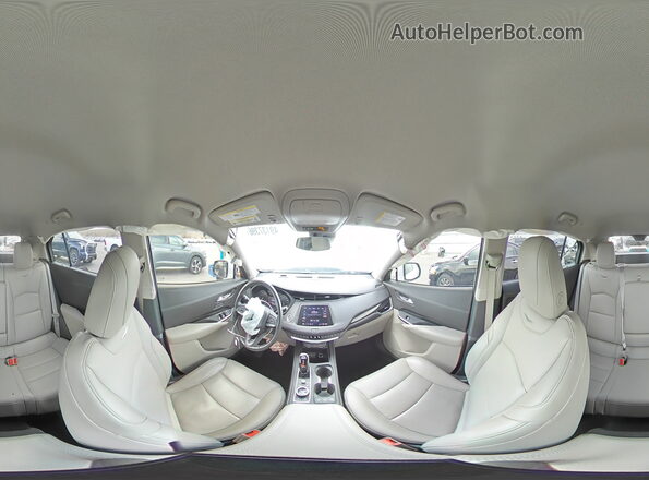 1GYFZDR49NF100593 2022 CADILLAC XT4 White 360 interior view