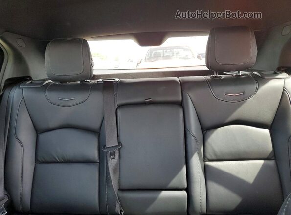 1GYFZDR4XPF177802 2023 CADILLAC XT4 Серый Вид задних сидений