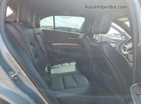 1GYFZDR4XPF177802 2023 CADILLAC XT4 Серый Вид задней части салона