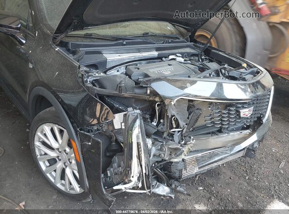 1GYFZFR44MF020533 2021 CADILLAC XT4 Black Widok z przodu