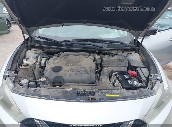 1N4AA6AP3GC375069 2016 NISSAN MAXIMA Серебряный Вид сзади