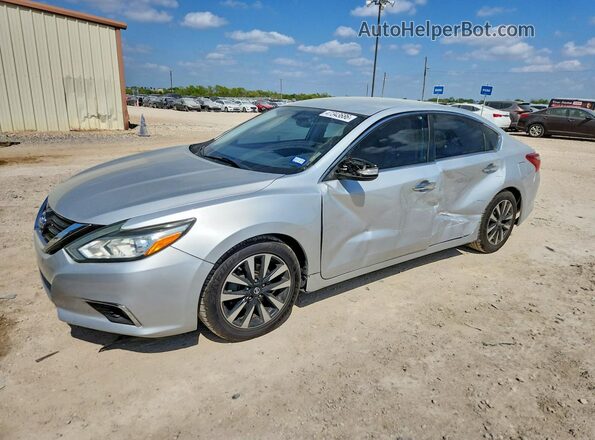 1N4AL3AP7JC157510 2018 NISSAN ALTIMA Silver Vista tres cuartos delantera izquierda