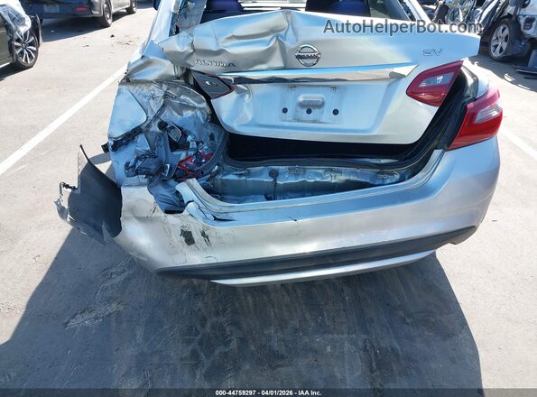 1N4AL3AP7JC197697 2018 NISSAN ALTIMA Silver Вид спереду
