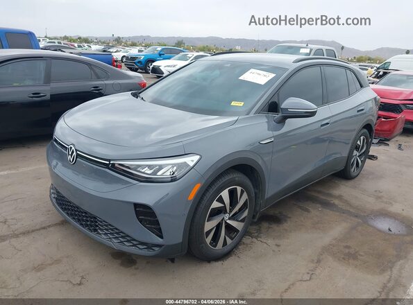 1V2CMPE86PC008233 2023 VOLKSWAGEN ID.4 Серый Передняя левая четверть