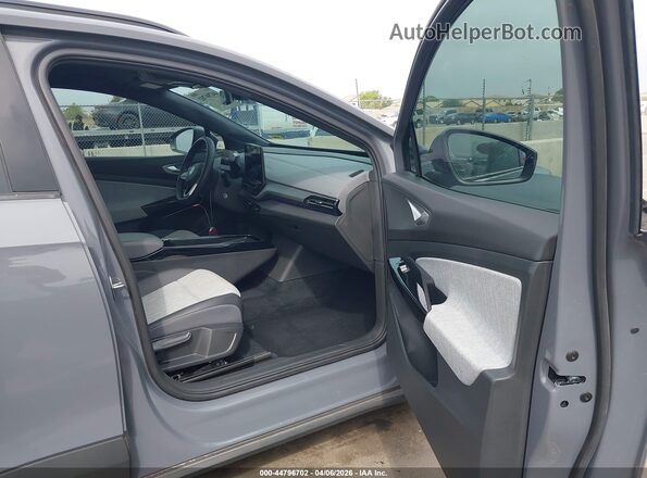 1V2CMPE86PC008233 2023 VOLKSWAGEN ID.4 Серый Вид салона спереди