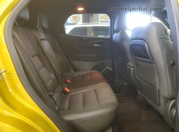 KL79MUSLXPB099674 2023 CHEVROLET TRAILBLAZER Yellow Вид задньої частини салону