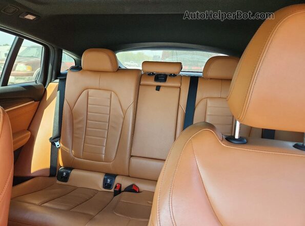 5UX2V1C02L9B53802 2020 BMW X4 Blue Widok wnętrza z tyłu