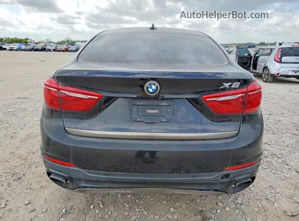 5UXKU6C57G0S82461 2016 BMW X6 Черный Вид салона спереди