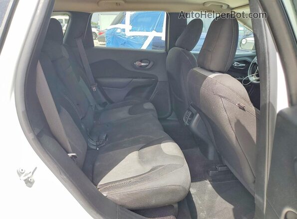 1C4PJLAB6GW234549 2016 JEEP CHEROKEE White Vista interior trasera