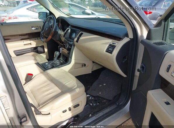 2FMGK5D84HBA07433 2017 FORD FLEX Золотой Вид салона спереди