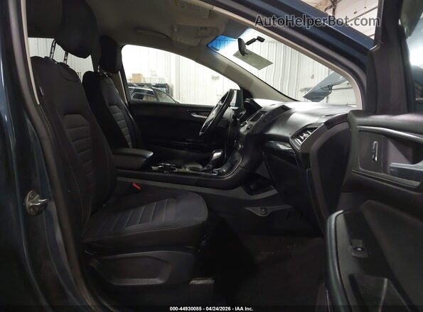 2FMPK4G92GBC20099 2016 FORD EDGE Blue Widok wnętrza z przodu