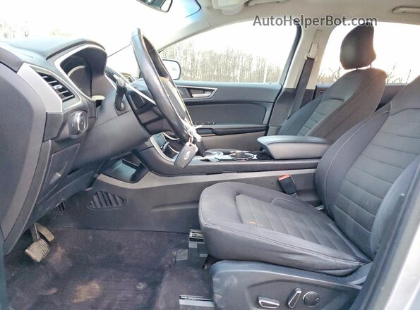 2FMPK4J80HBB44965 2017 FORD EDGE Серебряный Вид салона спереди