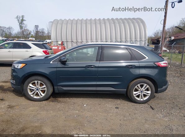 2FMPK4J91KBB73052 2019 FORD EDGE Blue Սալոնի հետևի տեսք