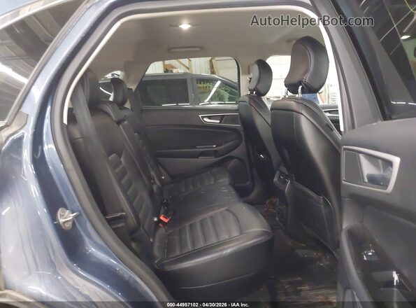 2FMPK4J93JBB79482 2018 FORD EDGE Blue Widok naklejki z numerem VIN