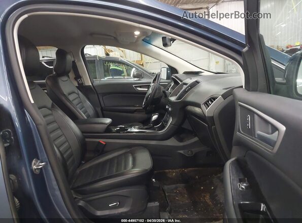 2FMPK4J93JBB79482 2018 FORD EDGE Blue Widok wnętrza z przodu