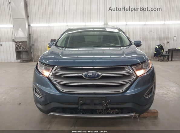 2FMPK4J93JBB79482 2018 FORD EDGE Blue Widok wnętrza z tyłu