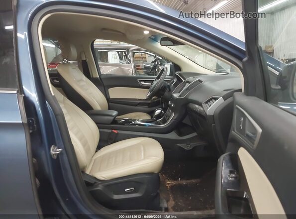 2FMPK4J95JBB26041 2018 FORD EDGE Blue Widok wnętrza z przodu