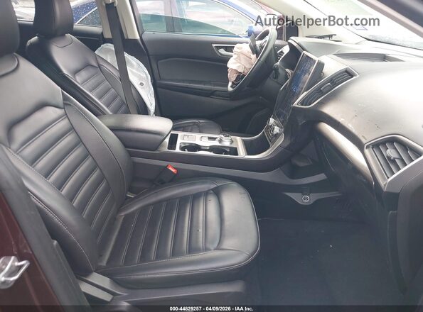 2FMPK4J96RBA37218 2024 FORD EDGE Maroon Widok wnętrza z przodu