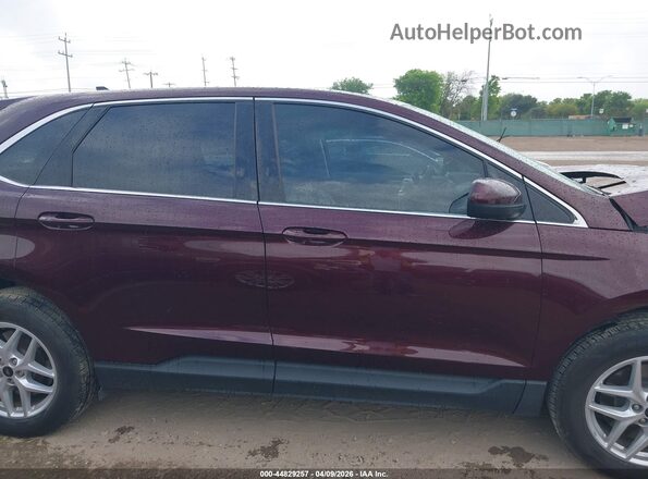 2FMPK4J96RBA37218 2024 FORD EDGE Maroon Widok wnętrza z tyłu